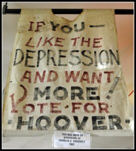 Blog Economic value: Image shows a "sandwich" board supporters of Franklin Roosevelt wore to oppose the reelection of President Hoover.