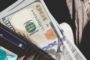 Blog Creating money out of thin air: Picture shows a sheaf of USD $100 bills