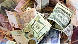 Blog What is money: Picture shows money of various nations in various denominations, bills and coins