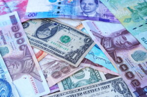 Blog Money and finance: A picture of banknotes of various countries and denominations.