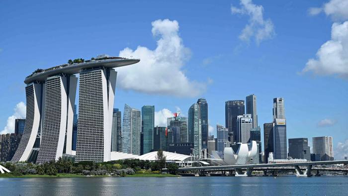 How did Singapore create high economic value and growth? Economic value: An image of the skyline of the central business district of Singapore