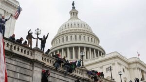 Blog Angrynomics: Image of Trump supporters storming the US Capitol on 6 Jan 2021
