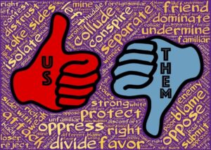 Blog Angrynomics: Image of a red thumbs up (us) and blue thumbs down (them)